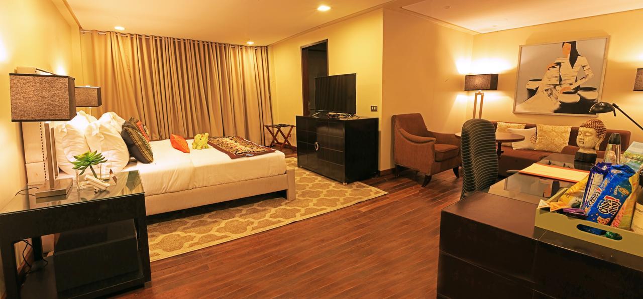 The Oriental Luxury Suites Alfonso Стая снимка